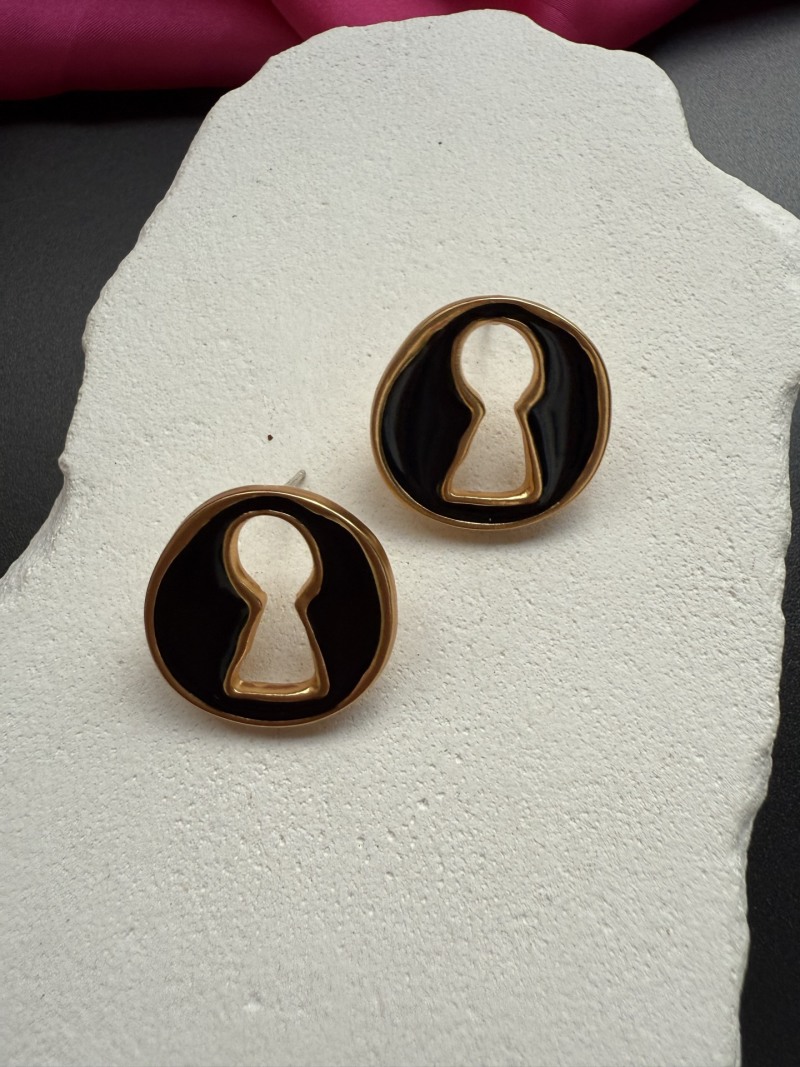 Серьги Schiaparelli в форме ключа