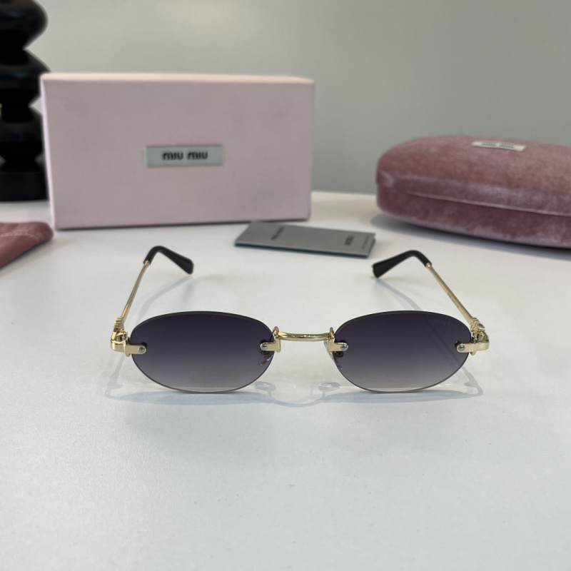 Солнцезащитные очки Miu Miu золотистого цвета