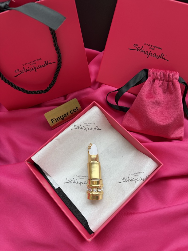 Комплект бижутерии в виде косметического аппарата Schiaparelli