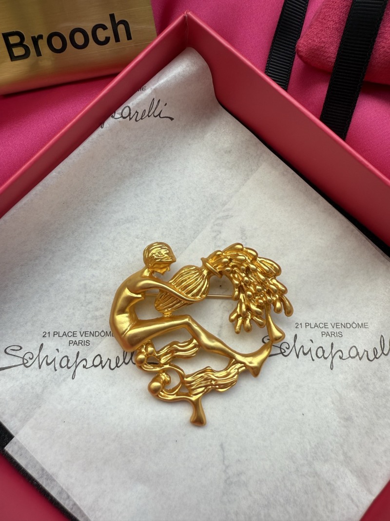 Брошь Schiaparelli