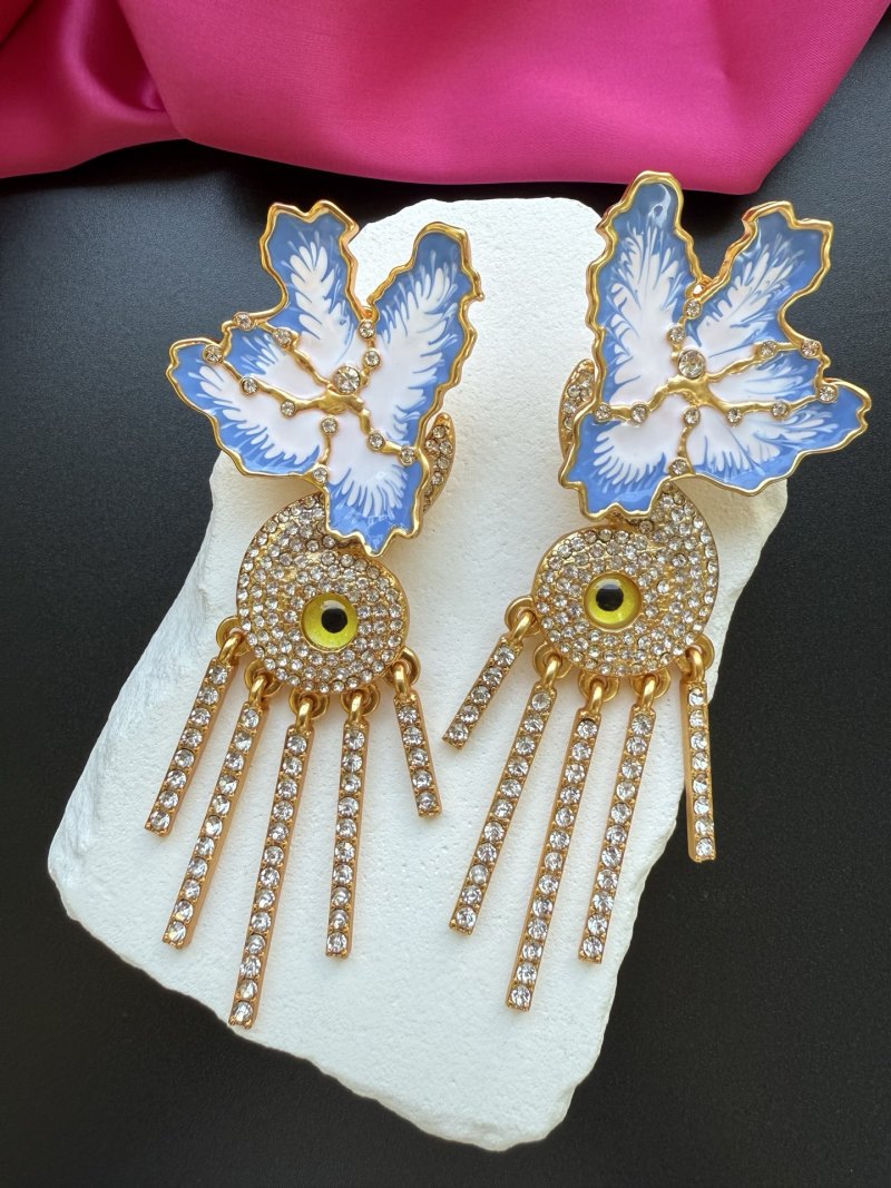 Серьги Schiaparelli с глазом и перьями