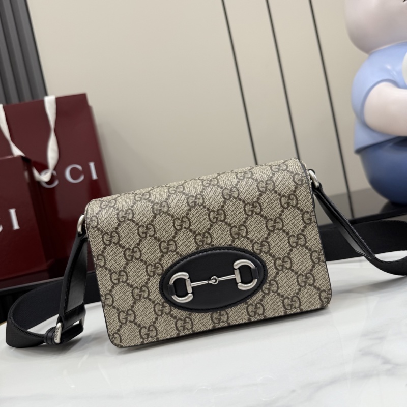 Сумка Gucci с принтом GG и подковкой