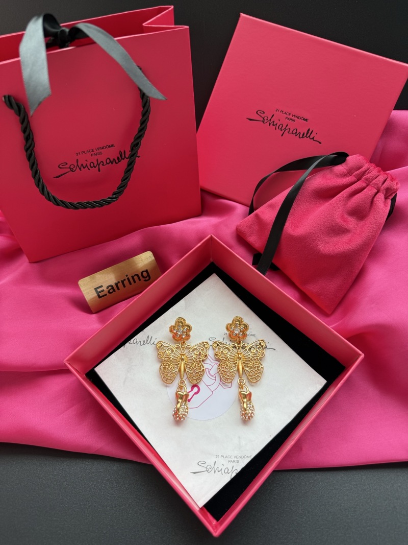 Золотистые серьги с бабочками и подвесками Schiaparelli