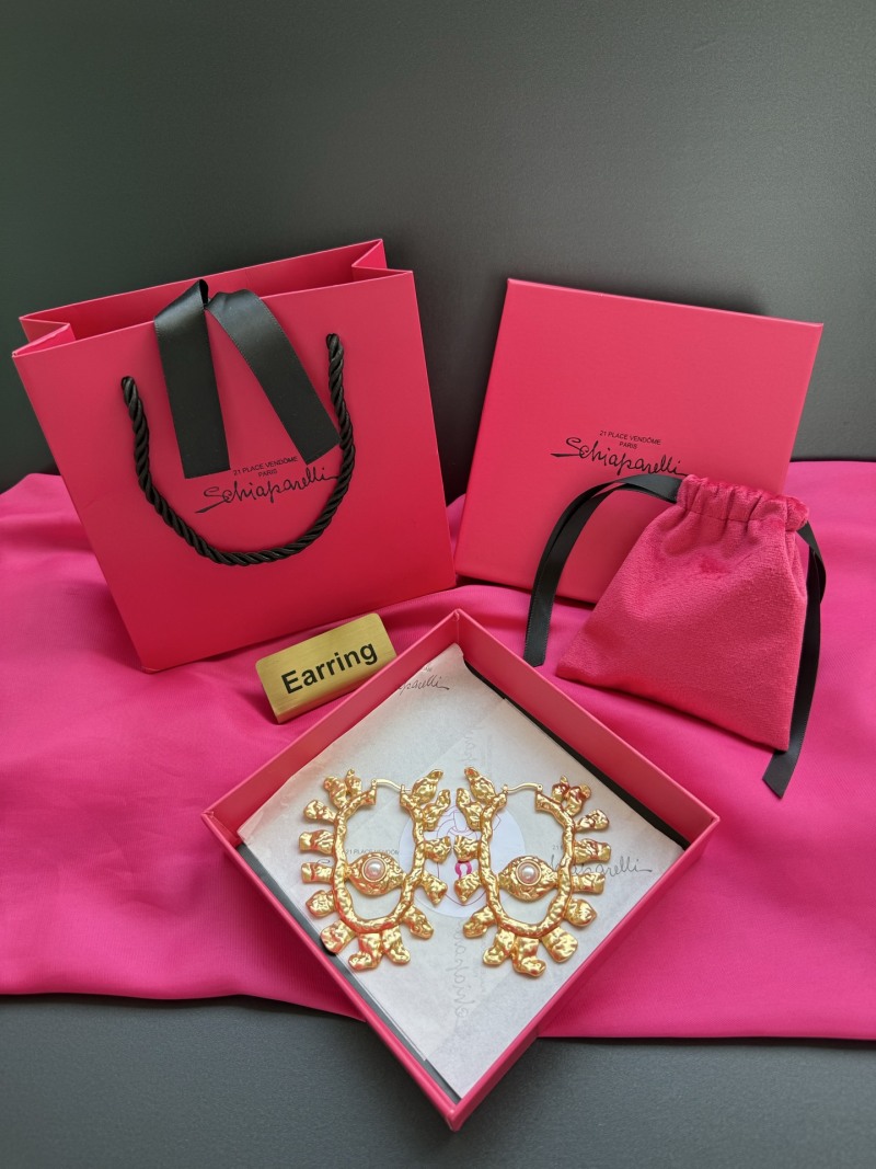 Золотистые серьги с жемчугом Schiaparelli