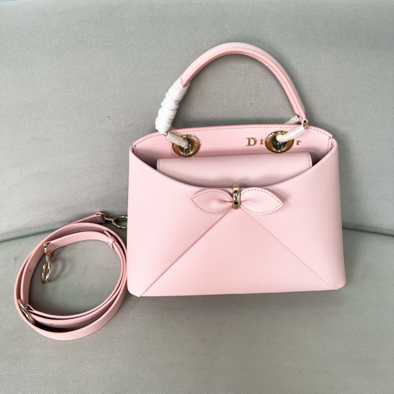 Женская кожаная сумка Dior Cigale розового цвета с бантом