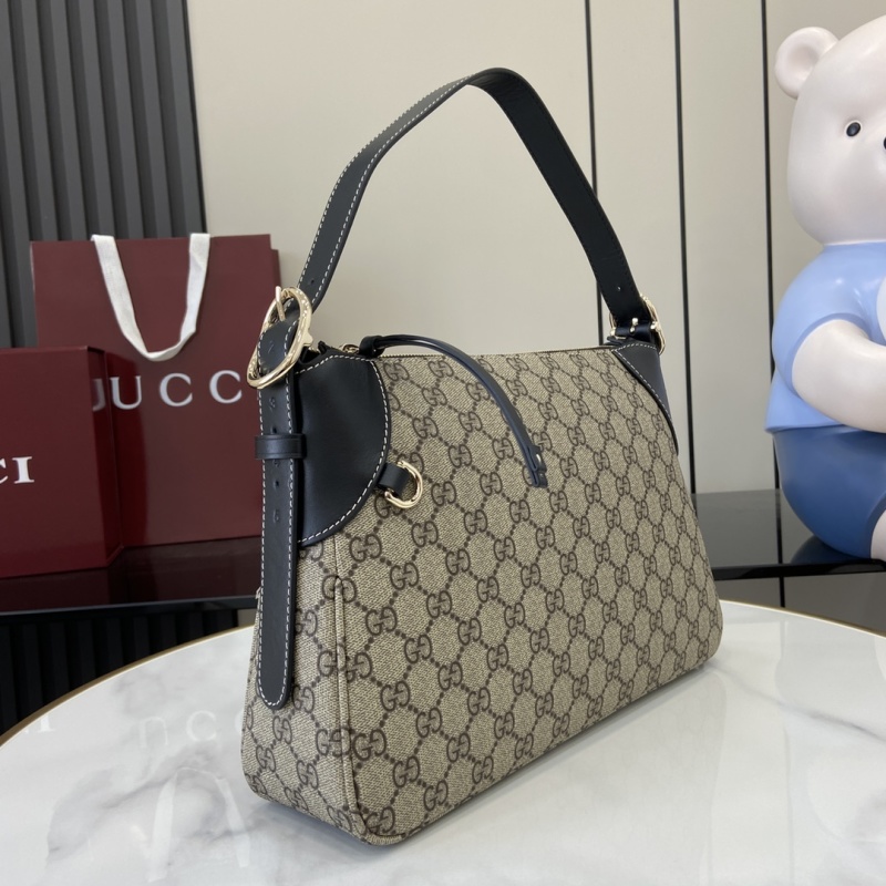 Сумка Gucci с монограммой и кожаными вставками