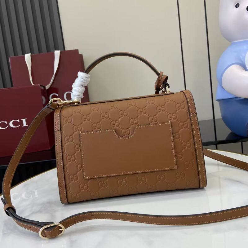 Женская сумка Gucci с замком и логотипом