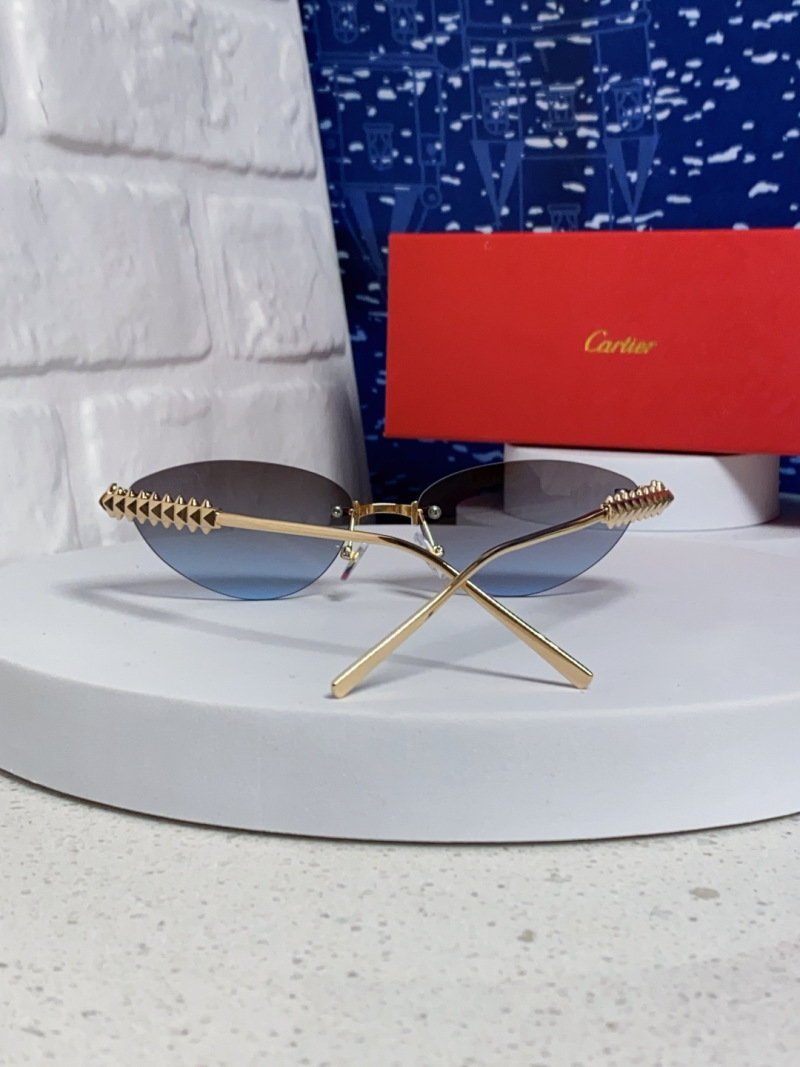 Женские солнцезащитные очки без оправы в золотистой оправе Cartier