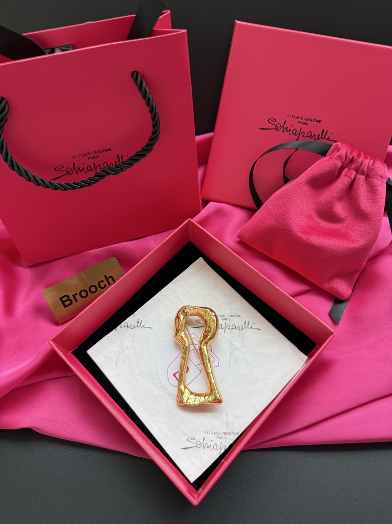Брошь Schiaparelli