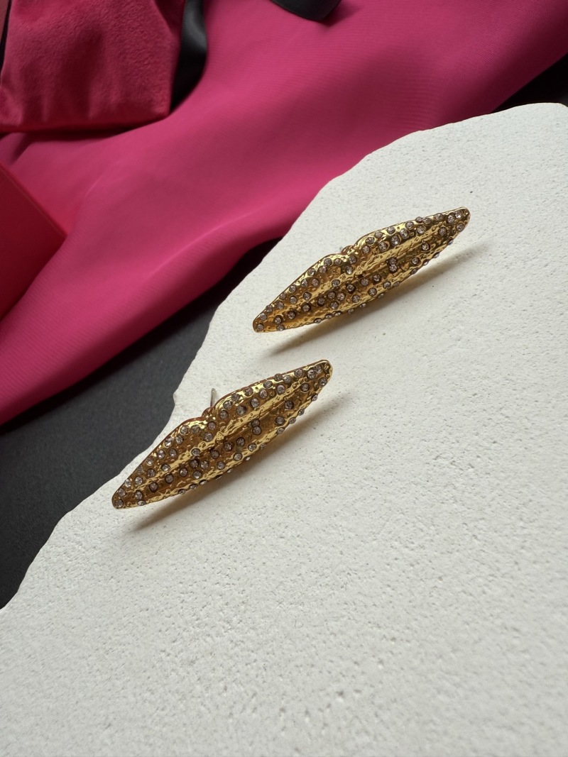 Брошь Schiaparelli