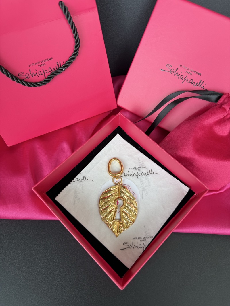 Подвеска в форме листа с ключом Schiaparelli