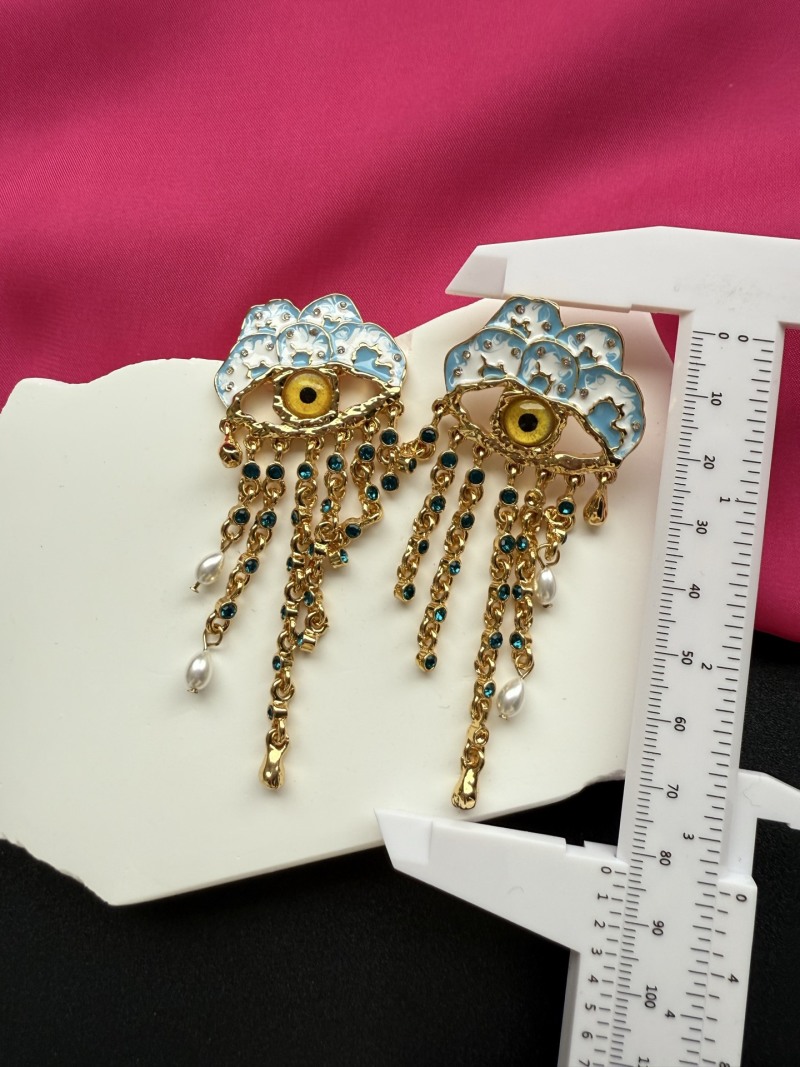 Серьги с глазом и подвесками Schiaparelli
