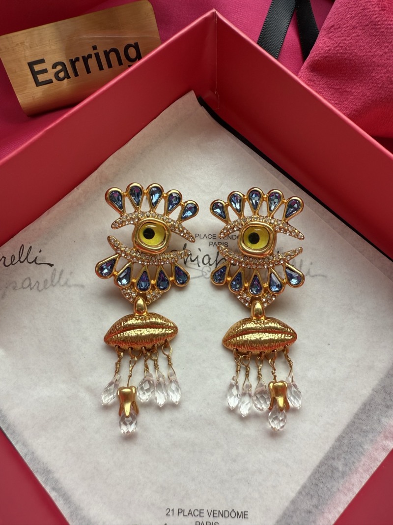 Серьги Schiaparelli с глазом и кристаллами