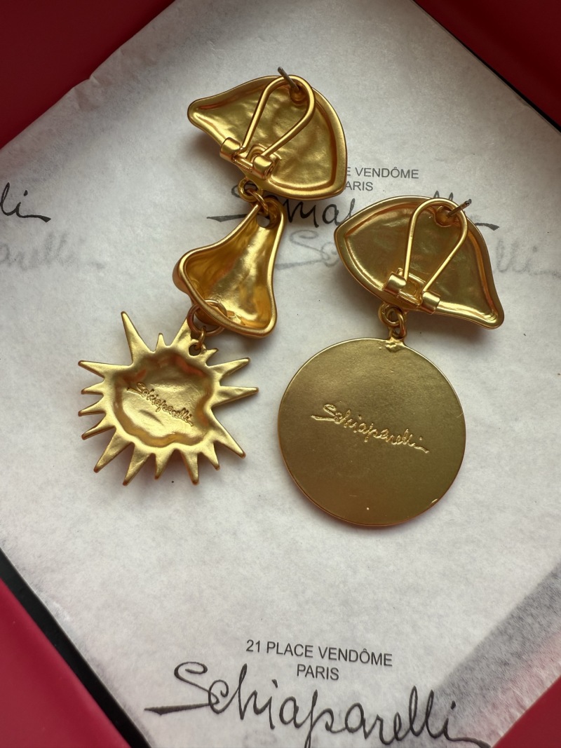 Серьги Schiaparelli с глазами и декоративными элементами