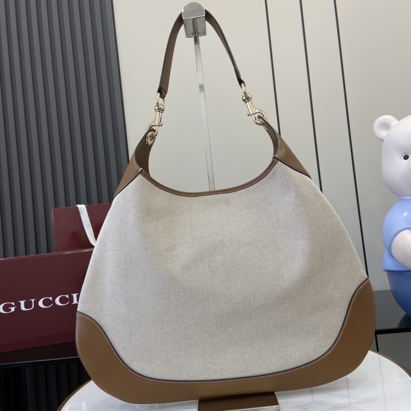 Сумка Gucci из канвы с кожаной отделкой