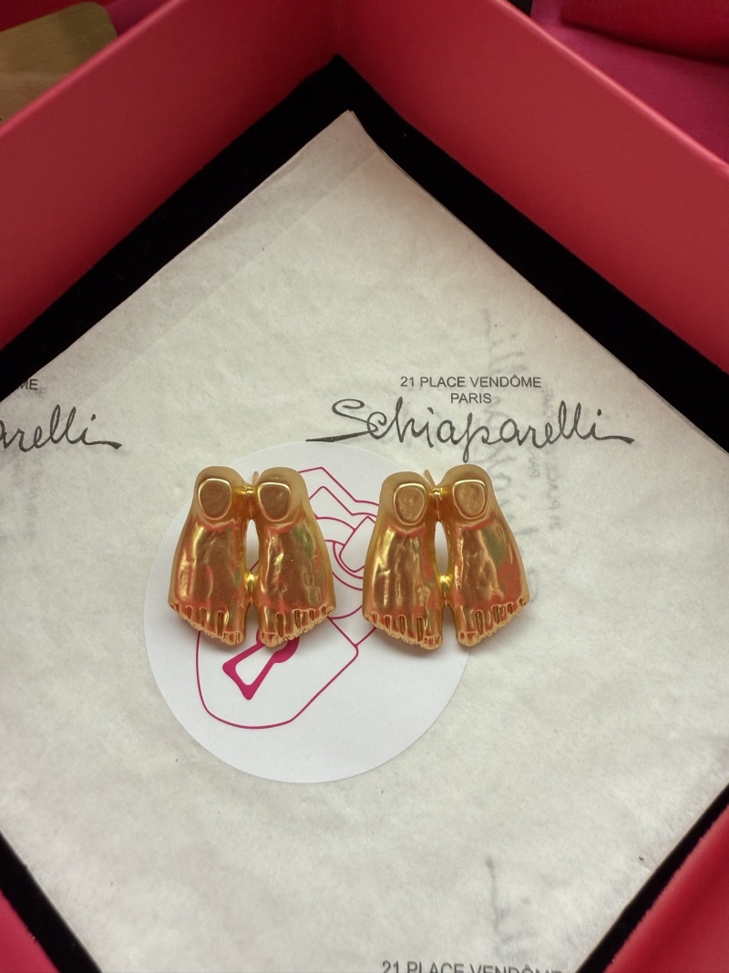 Серьги в форме ног Schiaparelli