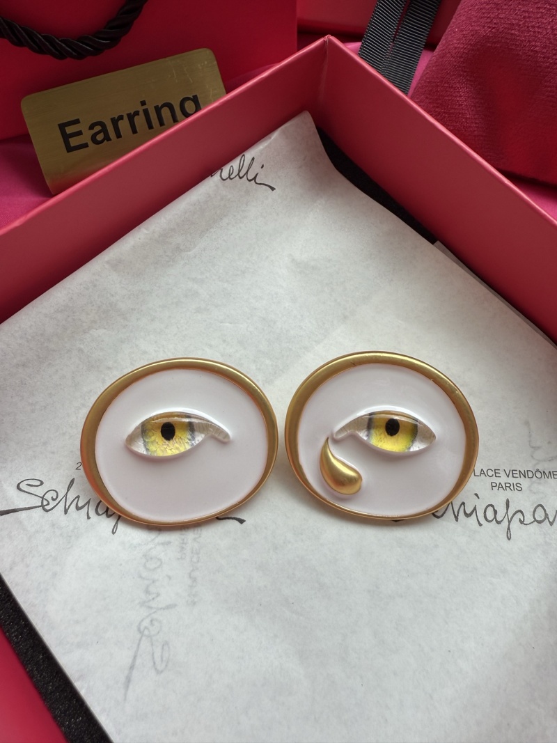 Серьги в виде глаз с золотой окантовкой Schiaparelli