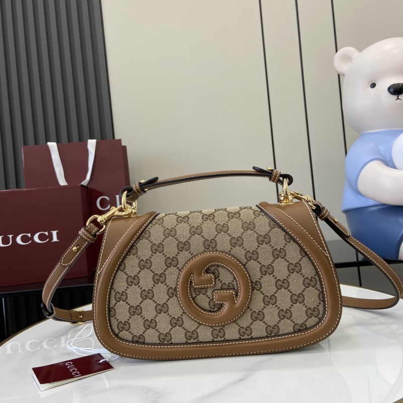 Сумка Gucci с монограммой и логотипом GG