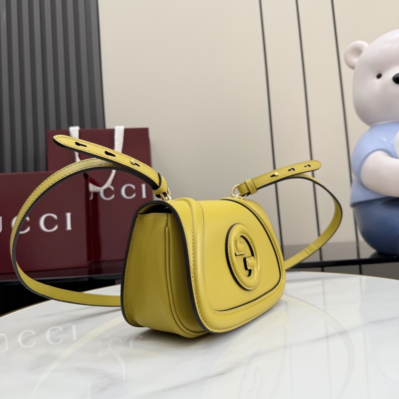 Желтая сумка Gucci с логотипом