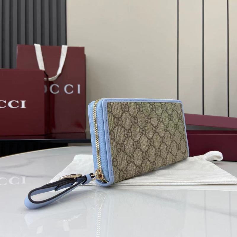Портмоне Gucci с монограммой и голубой окантовкой
