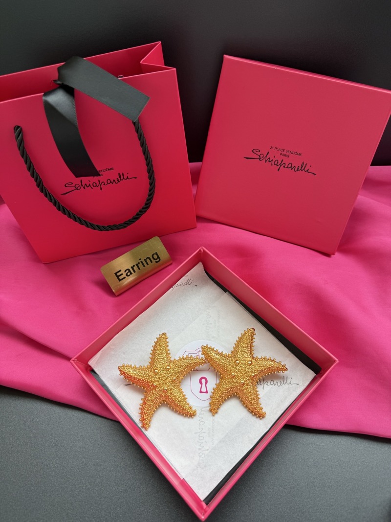Серьги в виде звезды Schiaparelli