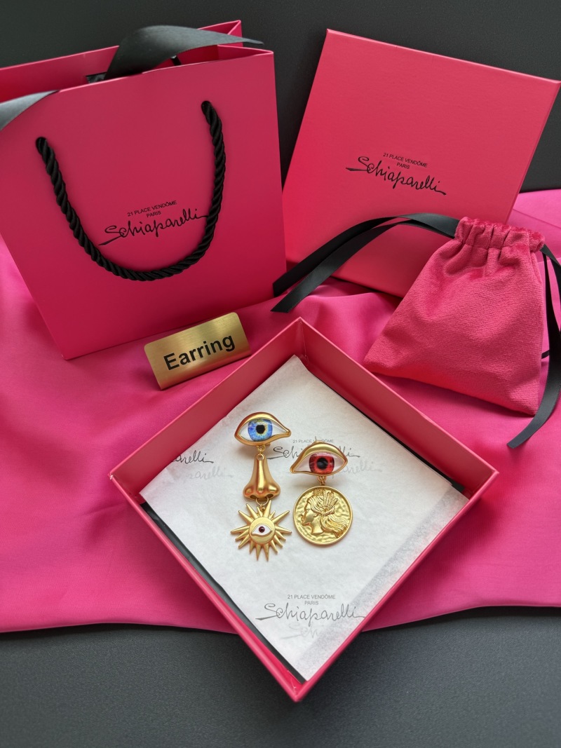 Серьги Schiaparelli с глазами и декоративными элементами