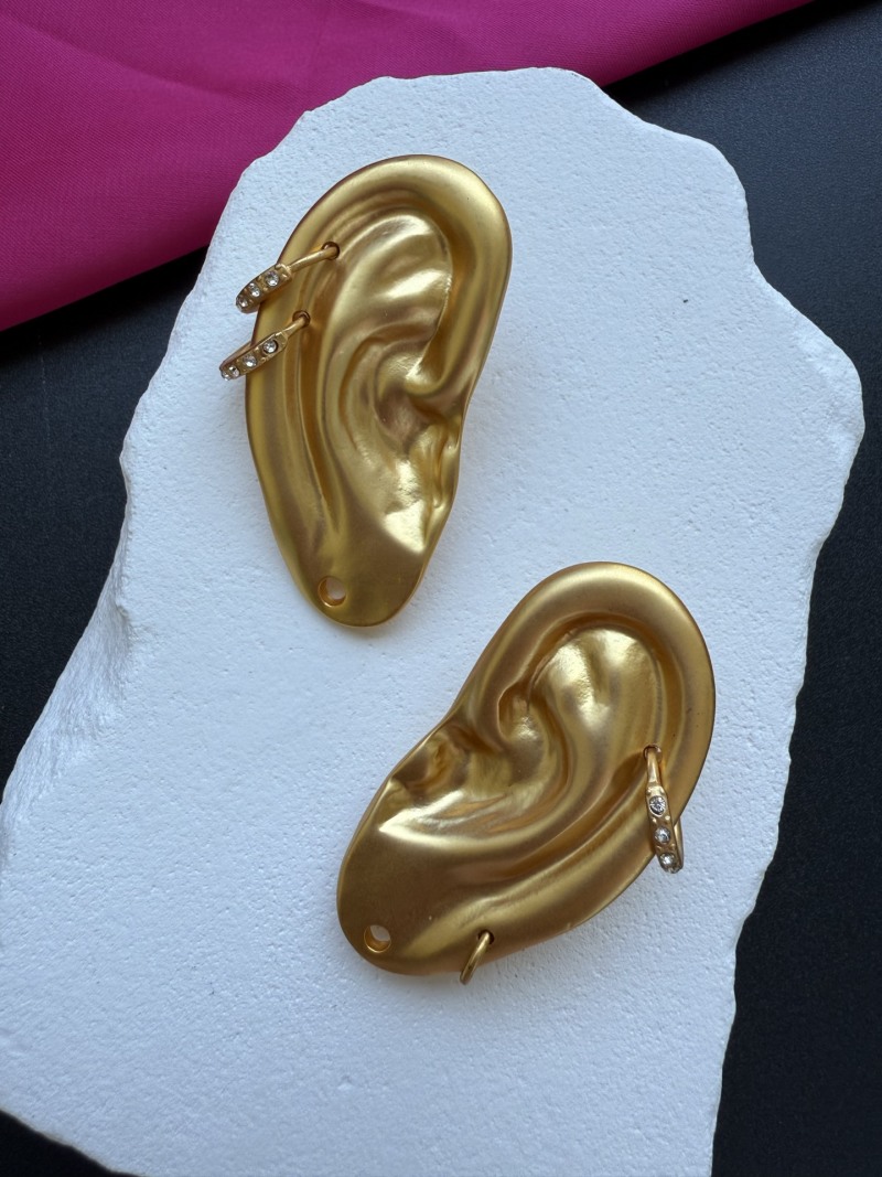 Серьги в форме уха с жемчугом Schiaparelli