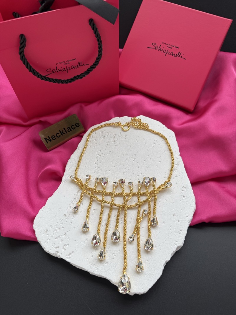 Золотистое колье с кристаллами Schiaparelli