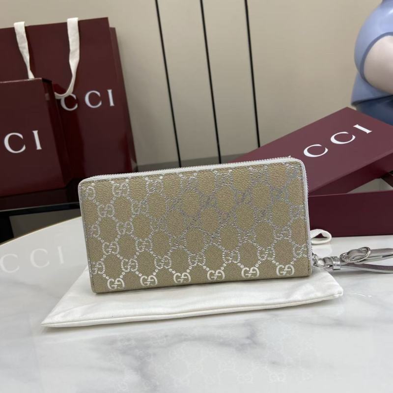 Кошелёк Gucci с монограммой и ремешком