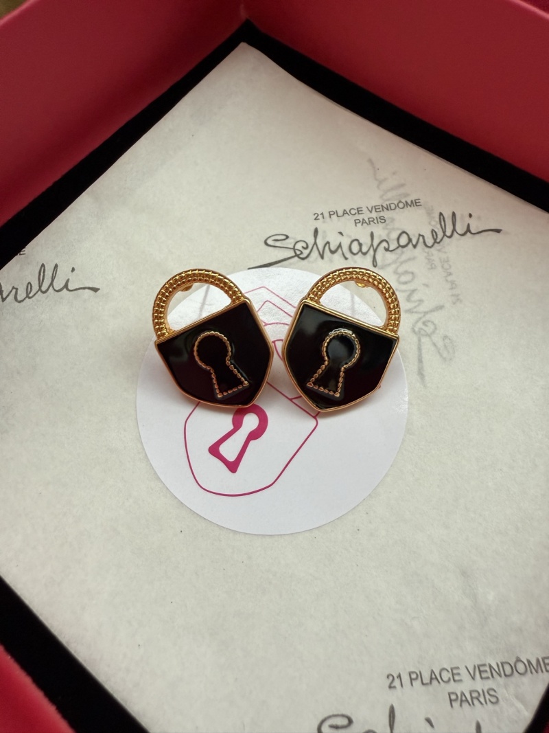 Серьги в виде замков Schiaparelli