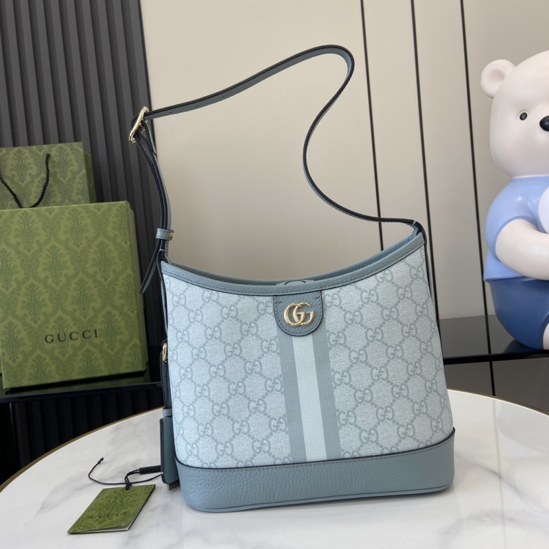 Сумка Gucci с монограммой и кожаной отделкой