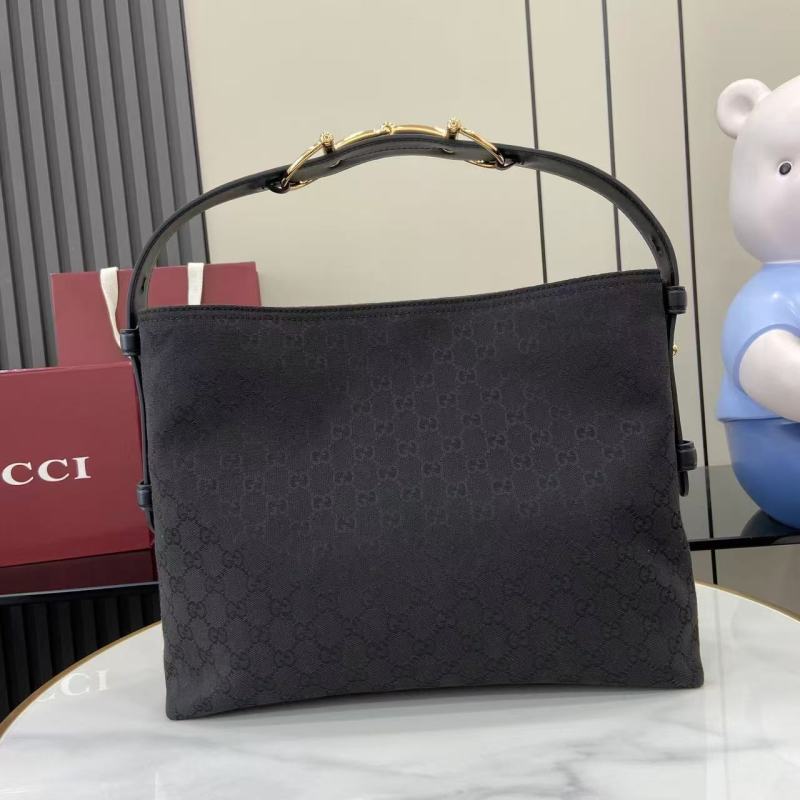 Сумка Gucci с монограммой и ручкой