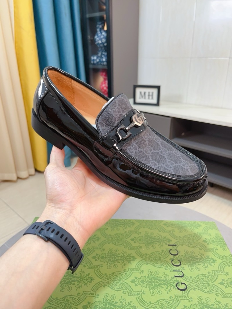 Мужские черные мокасины с декоративной пряжкой Gucci