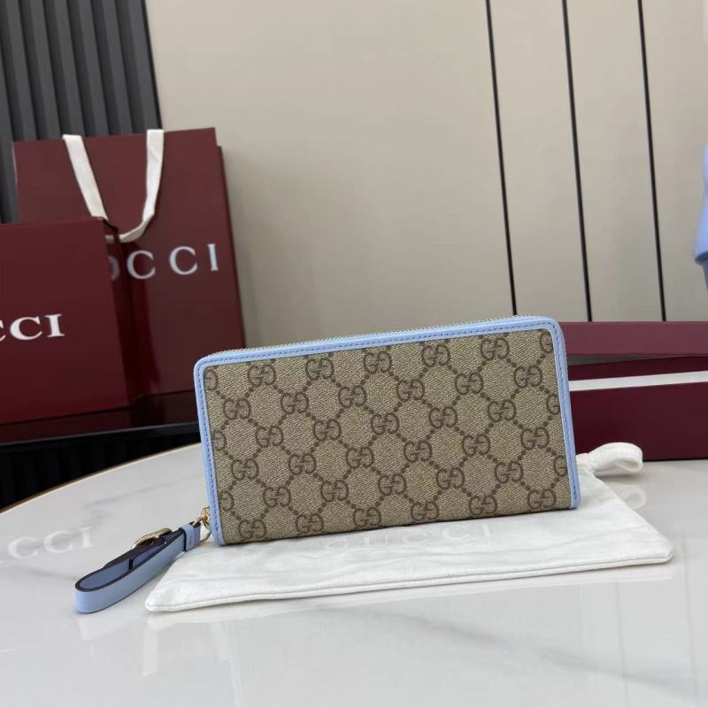 Портмоне Gucci с монограммой и голубой окантовкой