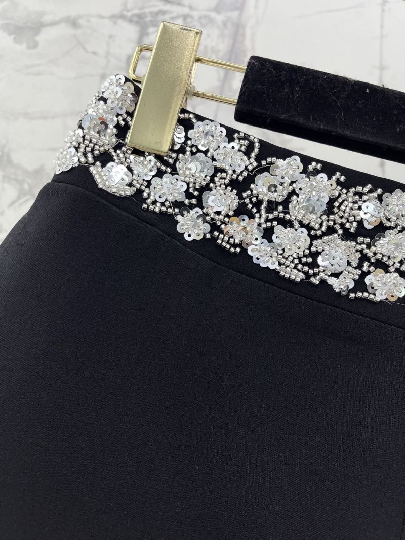 Чёрные брюки Chanel с кружевной отделкой